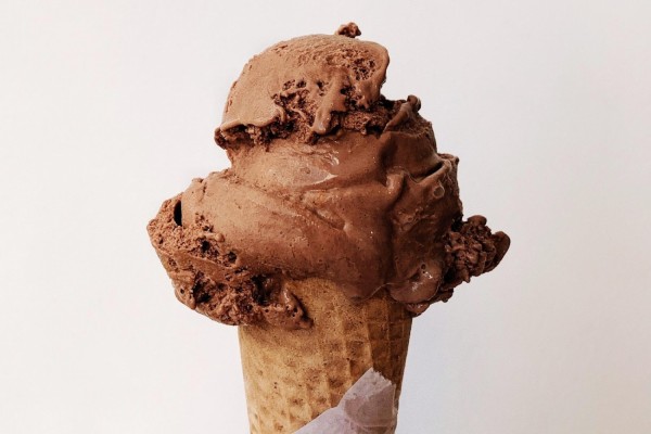 A picture of a chocolate ice cream cone, something that is offered on every cruise line with Royal Holiday Vacation Club.