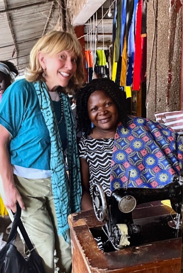 Sew into it: Franci Neely posing with a seamstress in Marché Central in Yaoundé, Cameroon, on Feb. 23, 2022