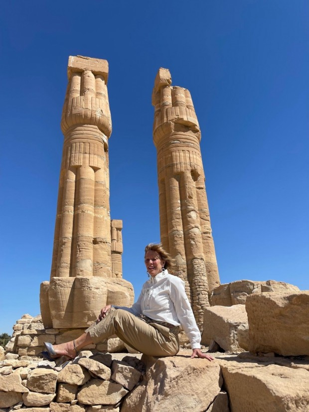 Sacred spot: Franci Neely siting by the Temple of Soleb, constructed during the reign of Amenhotep III sometime between 1378-1348 B.C., in Sudan on Feb. 12, 2022