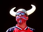 A fan from Norway wearing his Viking horns