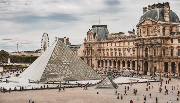 A view on Louvre and its famous pyramids.